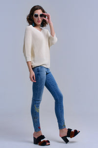 Calças skinny bordadas