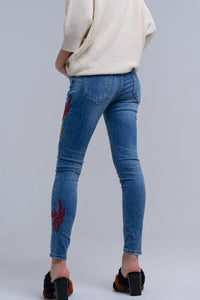 Calças skinny bordadas