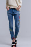 Calças skinny bordadas