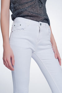 Calças skinny de cintura alta em branco