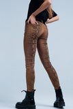 Calças skinny laranja em serpente