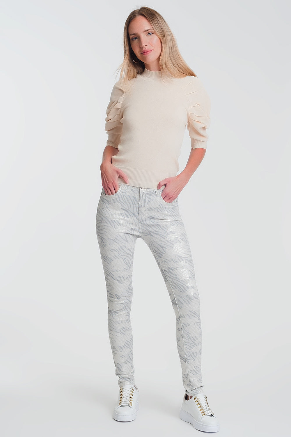 Calças super skinny com perneiras de camuflagem