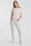 Calças super skinny com perneiras de camuflagem
