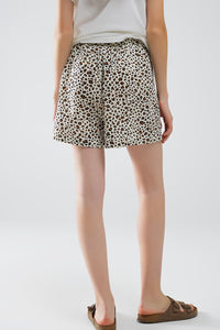 Calções com estampado de leopardo e cintura elástica com cordão