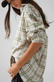 Camisa cuadros com abertura nas costas em bege