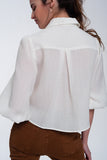 Camisa curta em branco com mangas insufláveis
