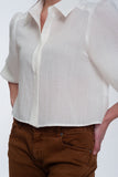 Camisa curta em branco com mangas insufláveis