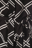 Camisa larga con diseño a cuadros negro