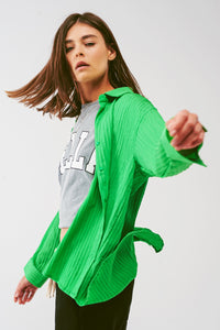 Camisa listrada folgada em verde