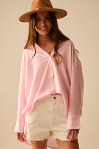 camisa rosa bebé de grandes dimensões com laço nas costas