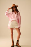 camisa rosa bebé de grandes dimensões com laço nas costas