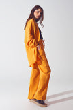 Camisa solta com textura em laranja