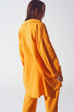 Camisa solta com textura em laranja