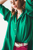 Camisa verde com detalhe de bolsillo