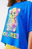 camiseta azul folgada com urso colorido