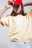 Q2 Camiseta com texto do distrito de Brooklyn em amarela