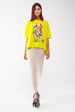 Camiseta lime folgada com urso colorido