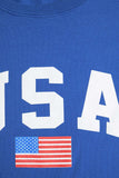 Camiseta longa azul solta com logotipo dos USA