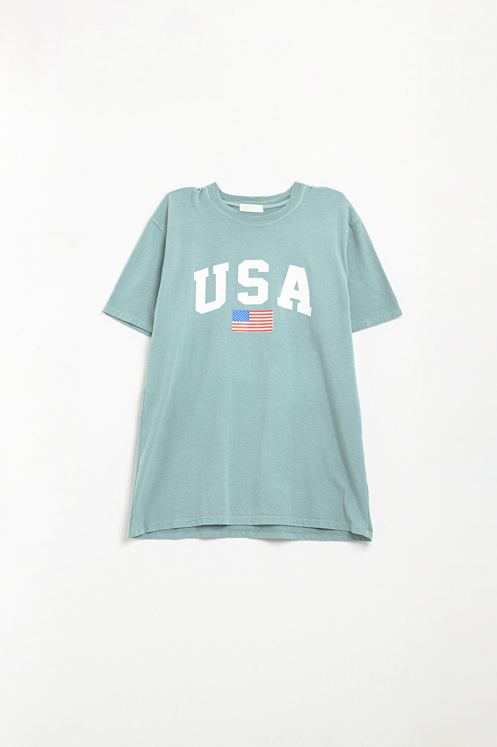 Camiseta longa solta verde com logotipo dos USA