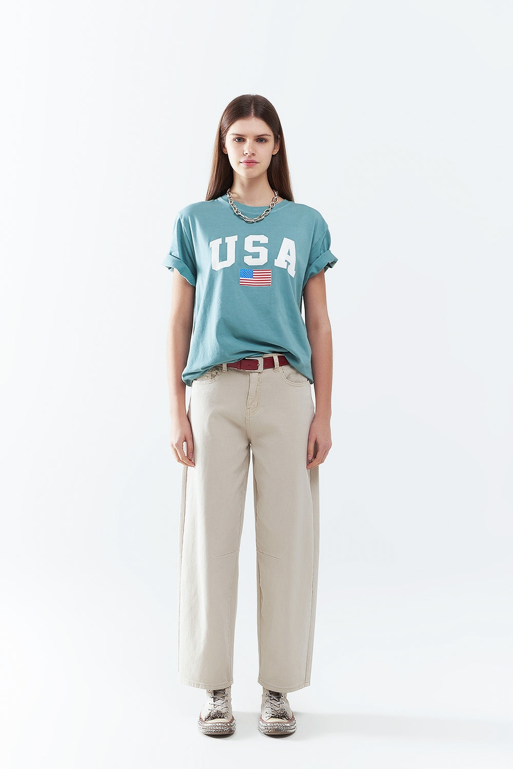 Camiseta longa solta verde com logotipo dos USA