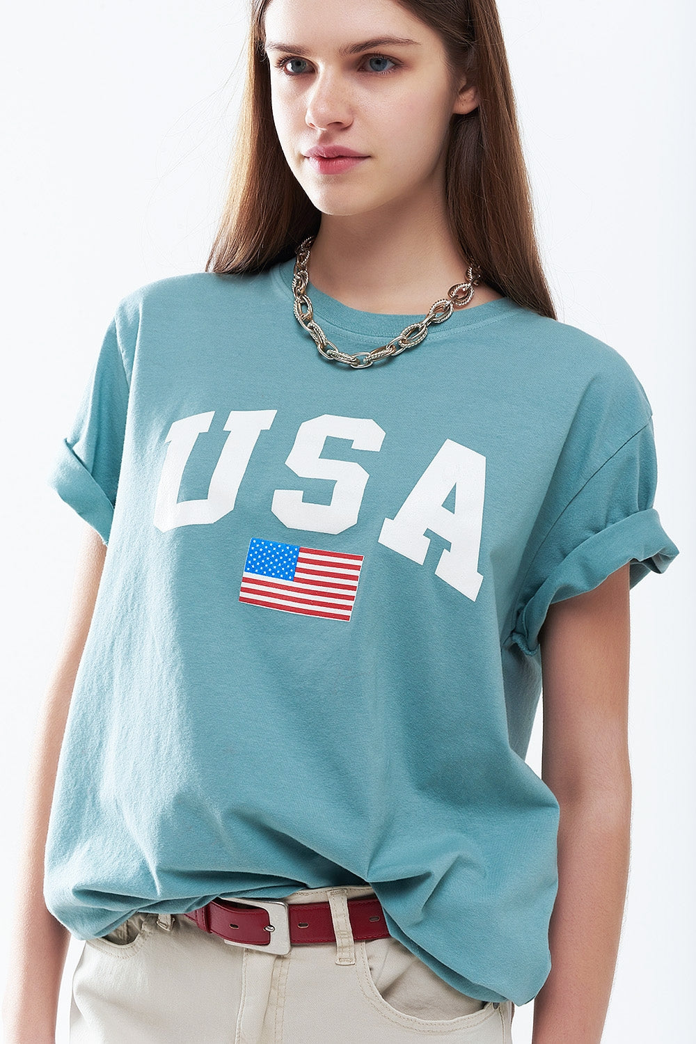 Camiseta longa solta verde com logotipo dos USA