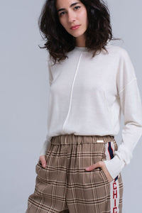 Q2 Camisola assimétrica em creme