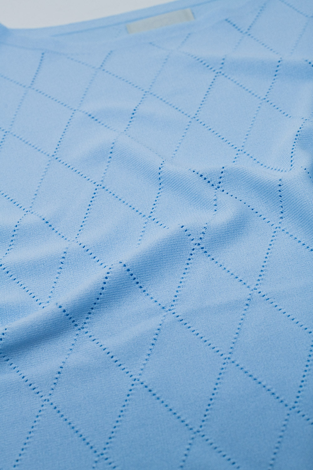 Camisola azul clara com estampado Argyle e gola boat