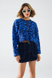 Camisola azul com estampado de leopardo em tecido de malha com lã