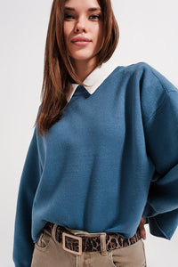 Camisola azul marinho curto com mangas de morcego
