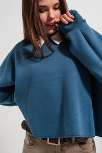 Camisola azul marinho curto com mangas de morcego