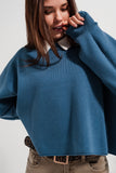 Camisola azul marinho curto com mangas de morcego