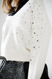 Camisola com decote em V e estrelas metálicas