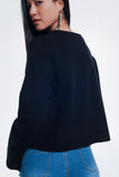 Camisola com detalhe de nervuras nas mangas cor preto