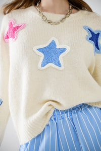 Camisola creme com estrelas bordadas