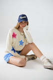 Q2 Camisola creme com estrelas bordadas