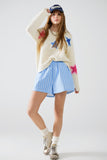 Camisola creme com estrelas bordadas