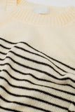Camisola creme com riscas castanhas e gola redonda
