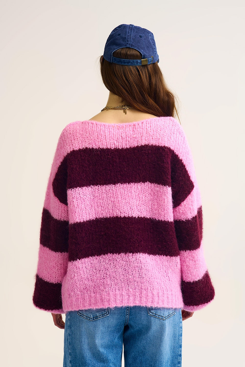 Camisola de malha às riscas cor-de-rosa com mangas em balão