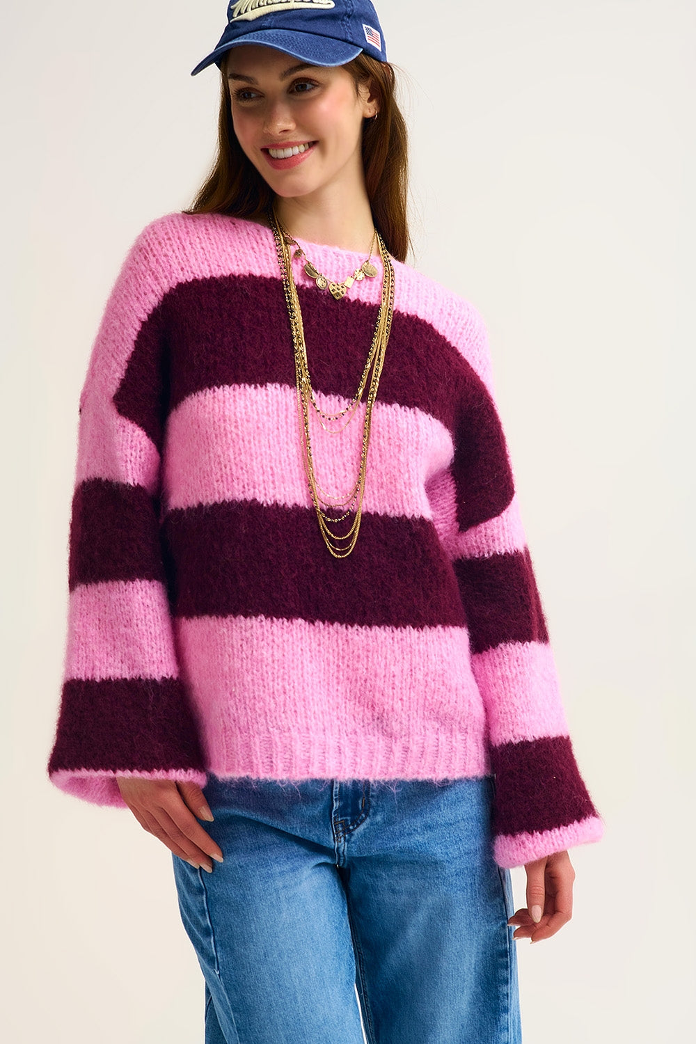 Camisola de malha às riscas cor-de-rosa com mangas em balão