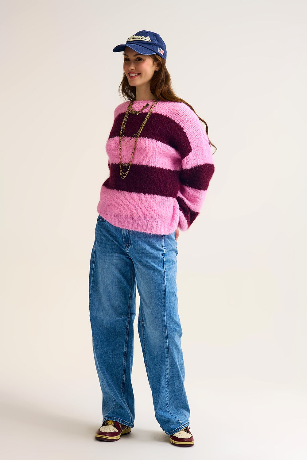Camisola de malha às riscas cor-de-rosa com mangas em balão