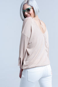 Camisola de malha cor-de-rosa com detalhes dourados em lurex