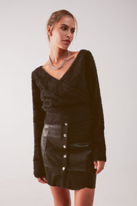 Camisola de malha fofa v pescoço em preto