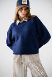 Camisola de malha macia em azul-marinho com mangas em balão