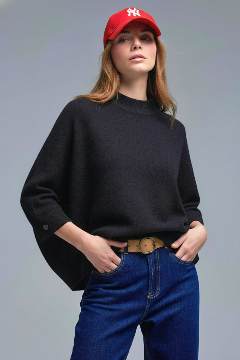 Camisola de malha preta com mangas e pormenores de bot›es