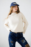 Camisola descontraída de gola alta com nervuras em creme