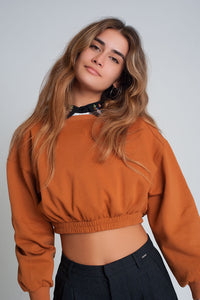 Camisola desportiva curta em camelo