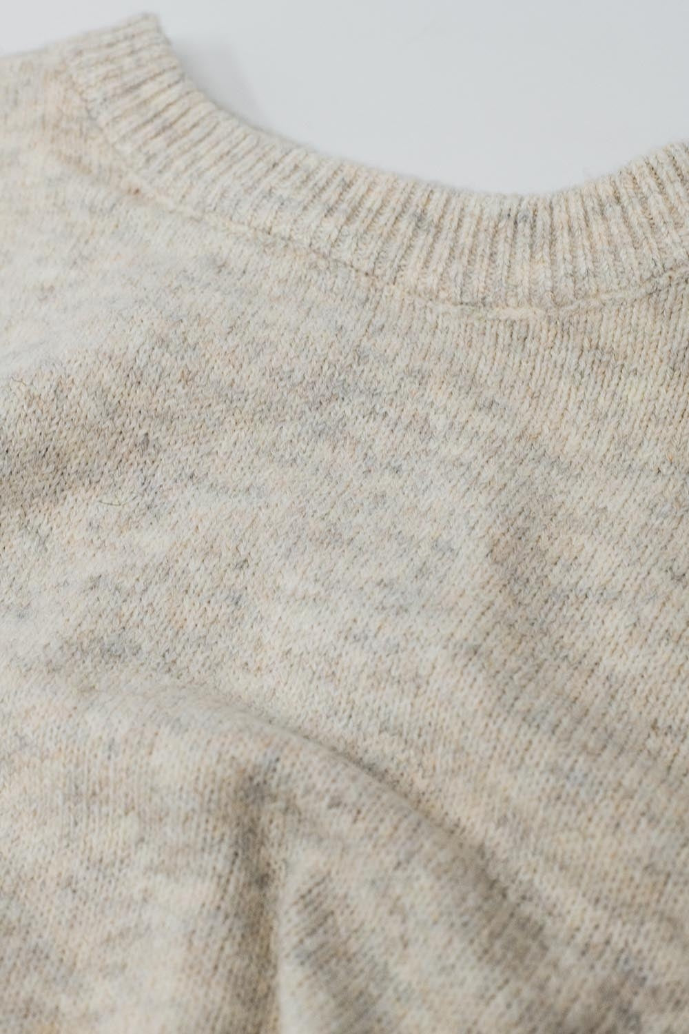 Camisola em malha macia beige com mangas em balão