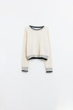 Camisola fofa em creme com pormenor de nervuras no pescoço e na bainha