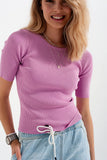 Camisola rosa trabalhada com nó nas costas