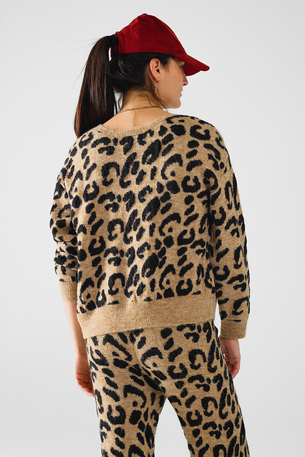 Casaco de manga comprida com estampado de leopardo e pormenor de laços